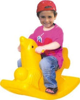 Bright yellow horse rocking chair for kids with a smiling child enjoying a fun ride
